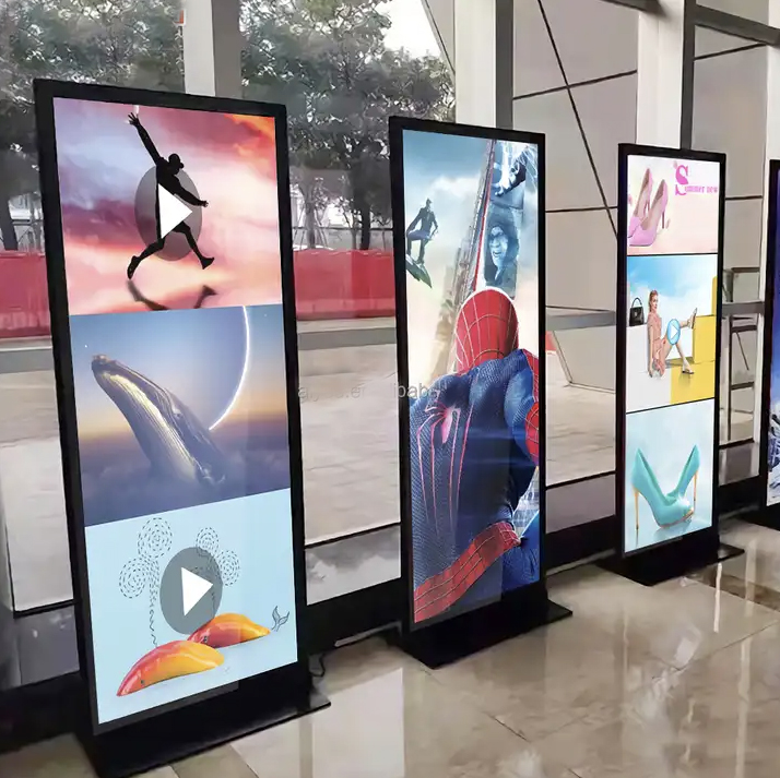 Tótems digitales verticales con publicidad en un lobby